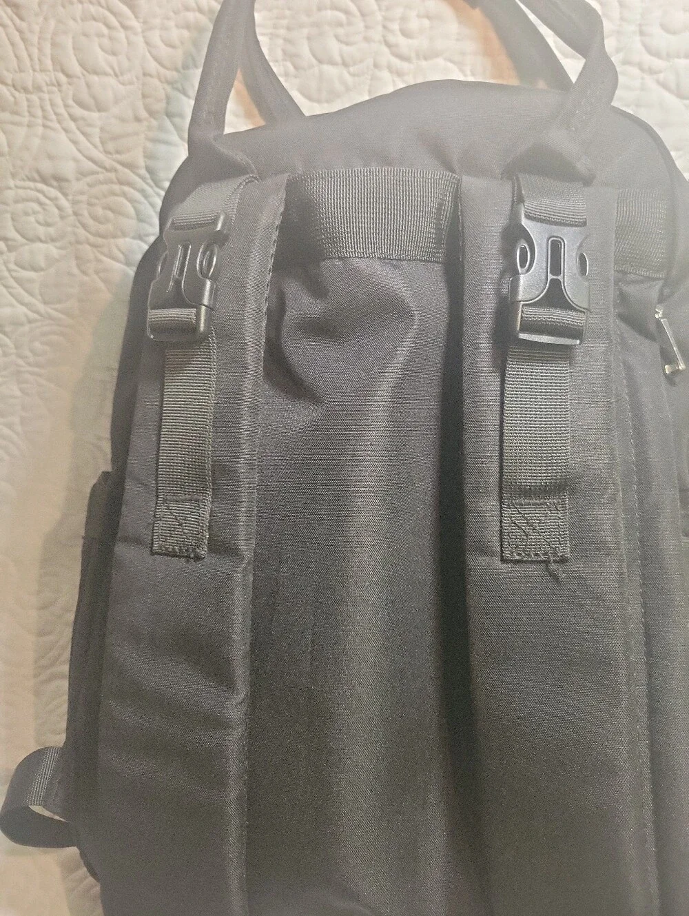 Black Quilted Backpack with Tan Accents